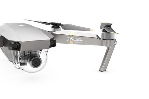 Close-up of a silver drone with a camera, labeled "Platinum Mavic Pro," featuring propellers and a 3-axis gimbal.