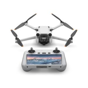 A white quadcopter drone and a remote control with a display screen showing a landscape image.