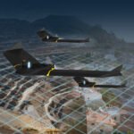 Three drones fly over a landscape combining a grid overlay. The background features a residential area and mountainous terrain.