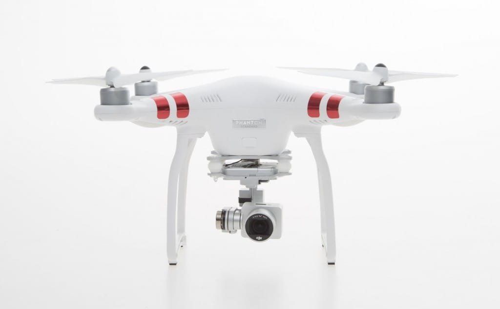 White drone with red stripes and a mounted camera, displayed against a plain white background.