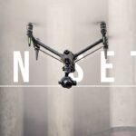 A drone is flying indoors against a foggy background. The text "ON SET" is overlaid on the image.