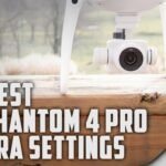 A DJI Phantom 4 Pro drone camera is positioned on a wooden surface, with text overlay reading "The Best DJI Phantom 4 Pro Camera Settings.